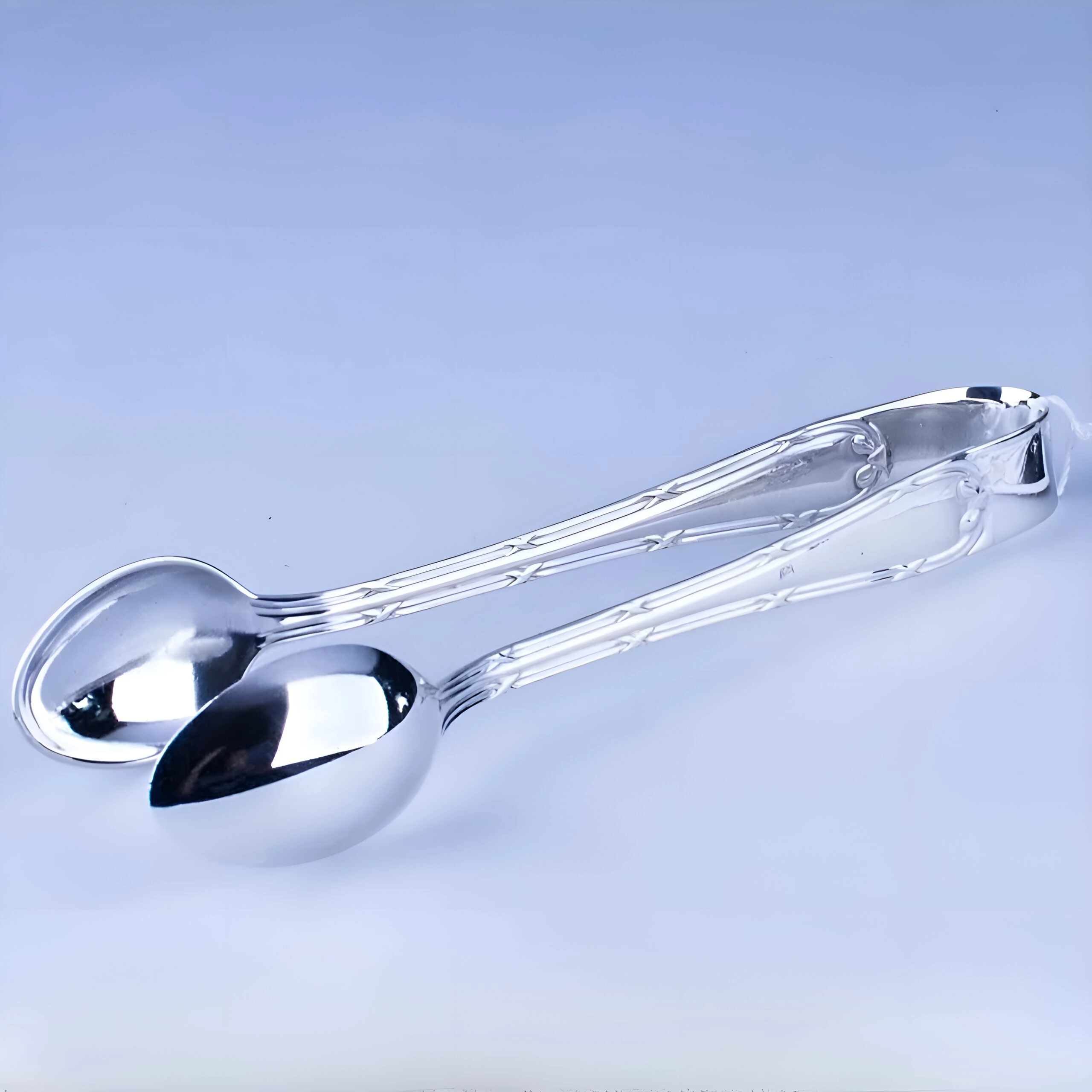 серебряные щипцы для сахара