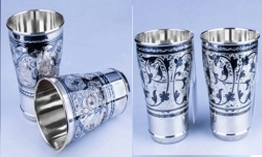 Серебряные стаканы и подстаканники