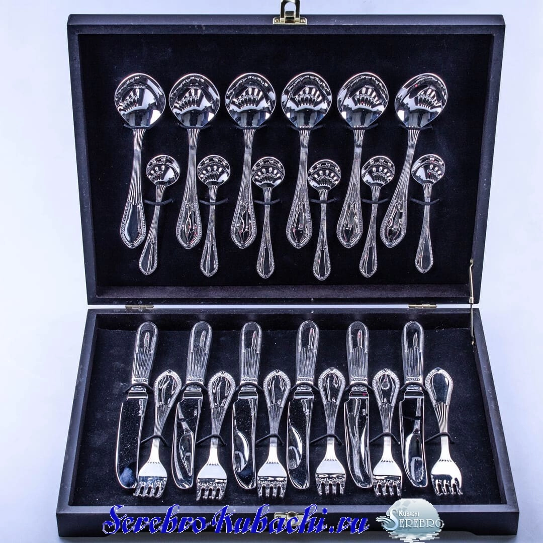 набор столовых приборов из серебра