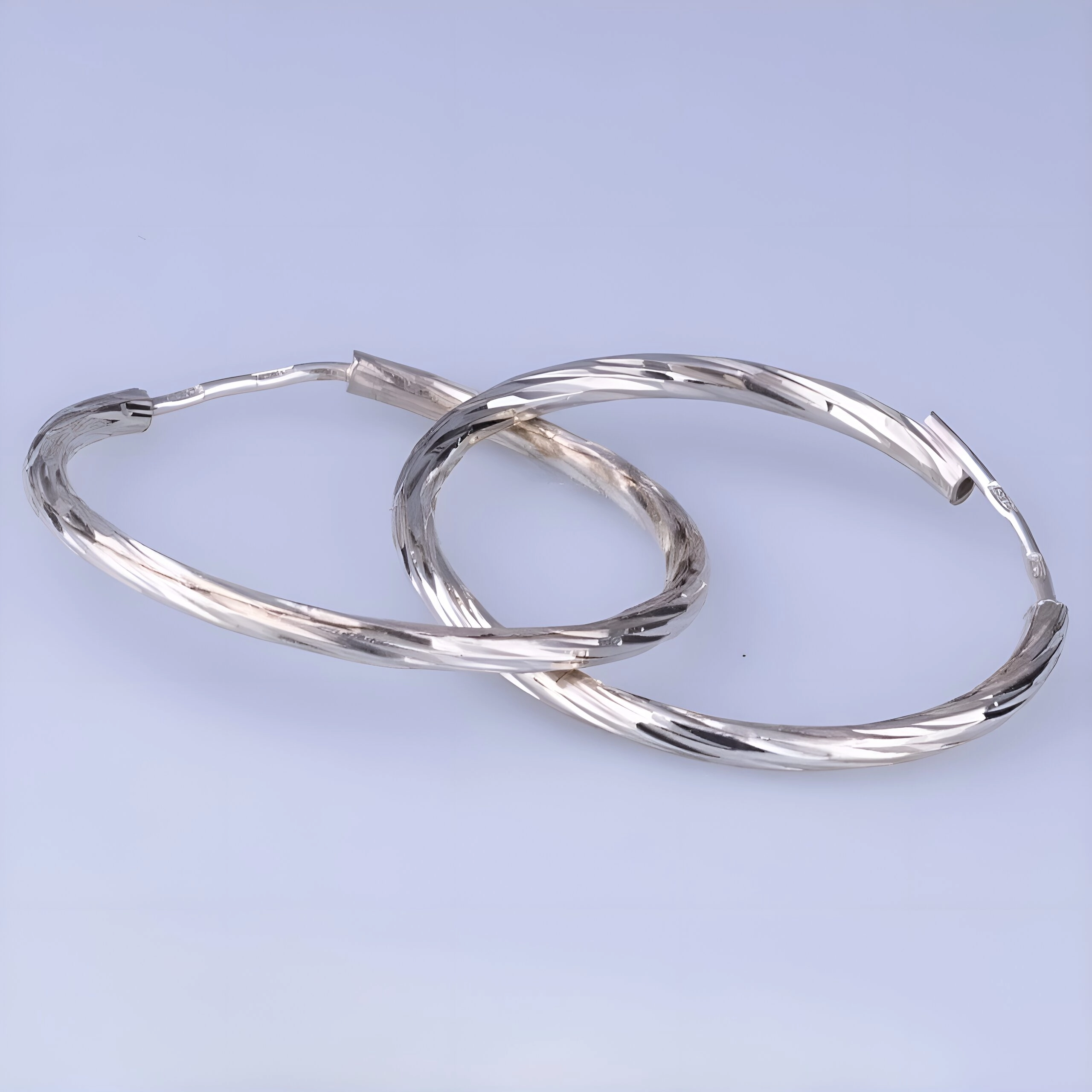 серебряные серьги конго