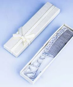 серебряная расческа в футляре