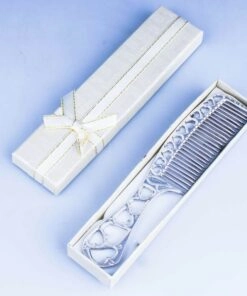 серебряная расческа в футляре