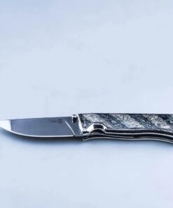 складной серебряный нож
