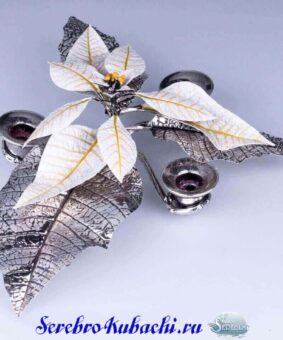 серебряный подсвечник на три свечи