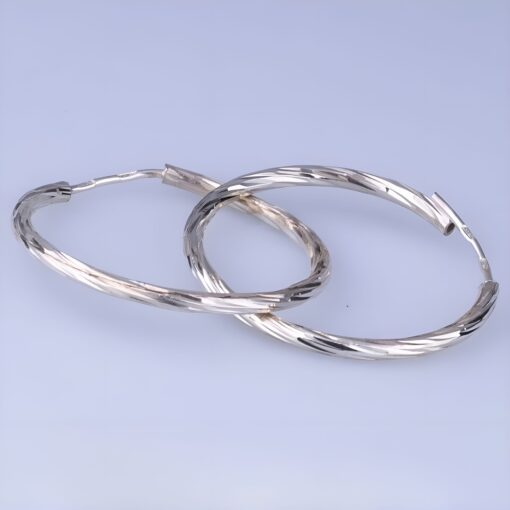 серебряные серьги конго